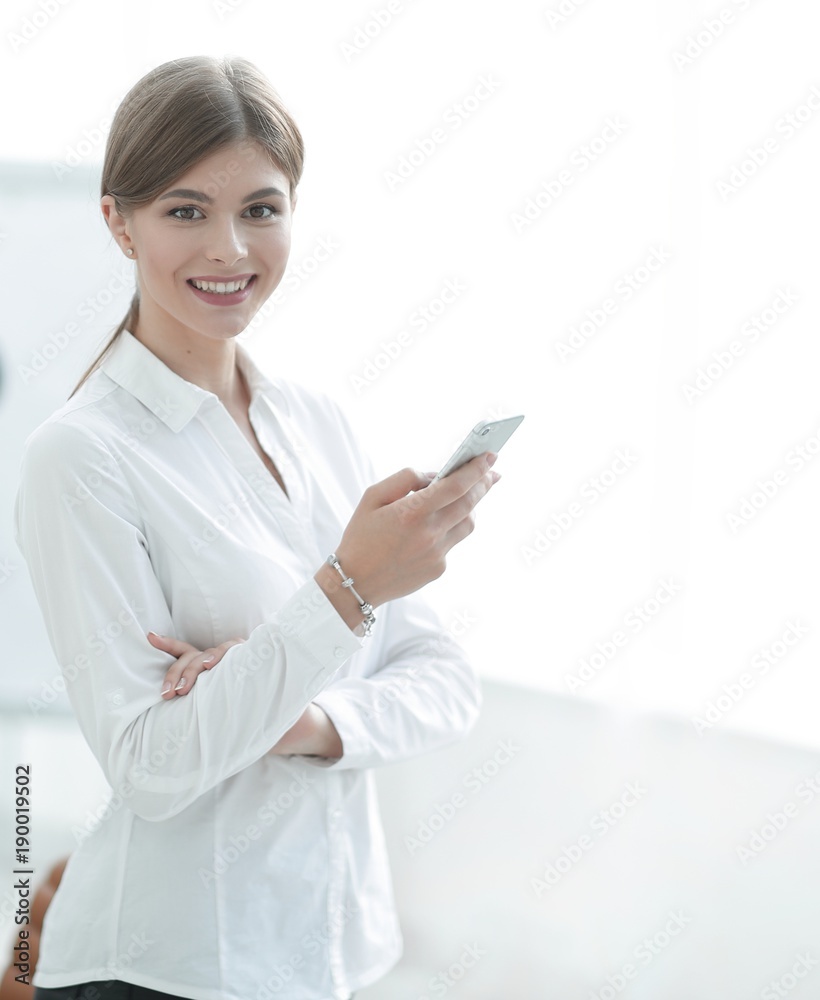 Closeup portrait young business woman, looking at cell phone Closeup portrait young business woman, looking at cell phone