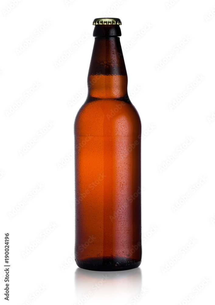 Brown glass beer bottle with black cap with dew Brown glass beer bottle with black cap with dew