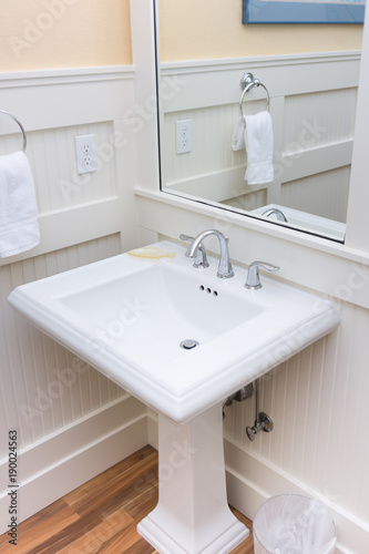 Bright white bathroom pedestal sink