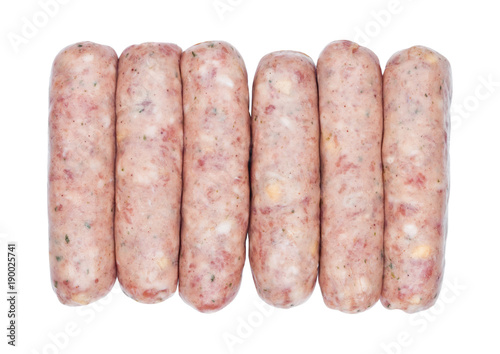 Plastic tray of raw pork beef sausages on white