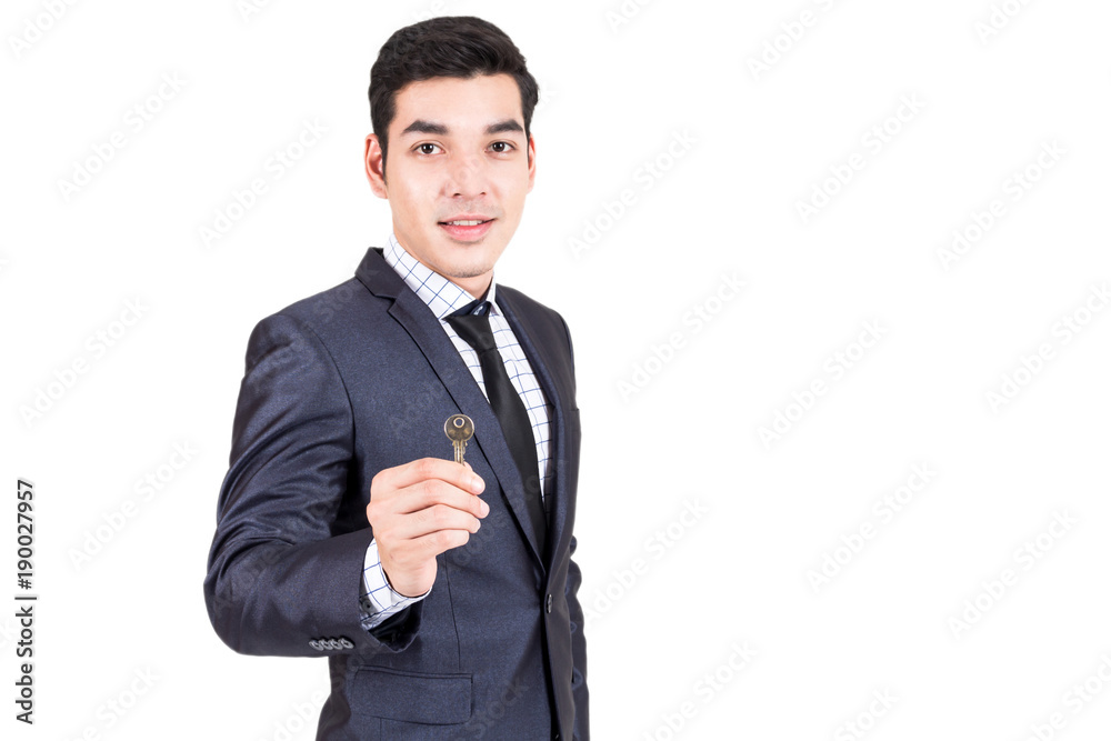 Businessman holding keys isolated on white background Businessman holding keys isolated on white background