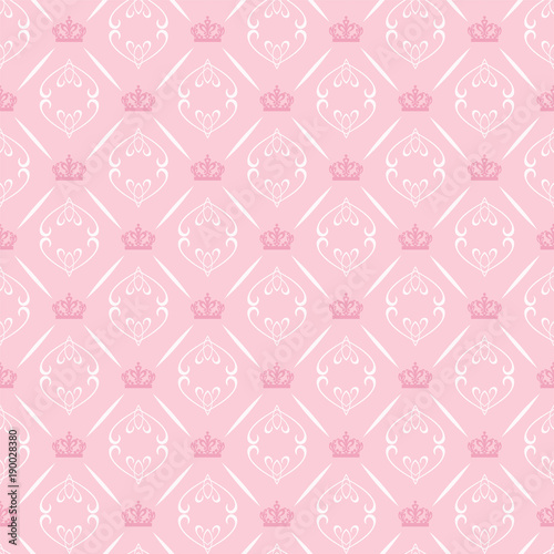 Seamless pattern with crowns in royal style on a pink background