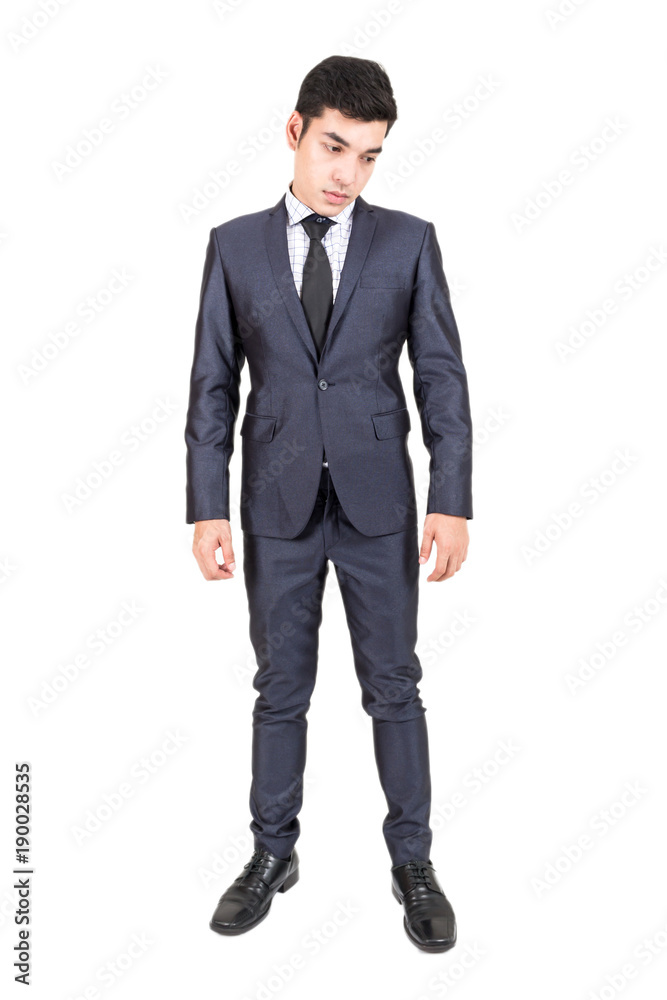 Businessman in black suit standing isolated on white background Businessman in black suit standing isolated on white background