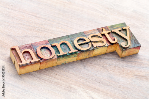 honesty word abstract in wood type photo
