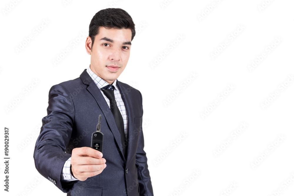 Man dealer giving car keys to you.dealership and rental concept Man dealer giving car keys to you.dealership and rental concept