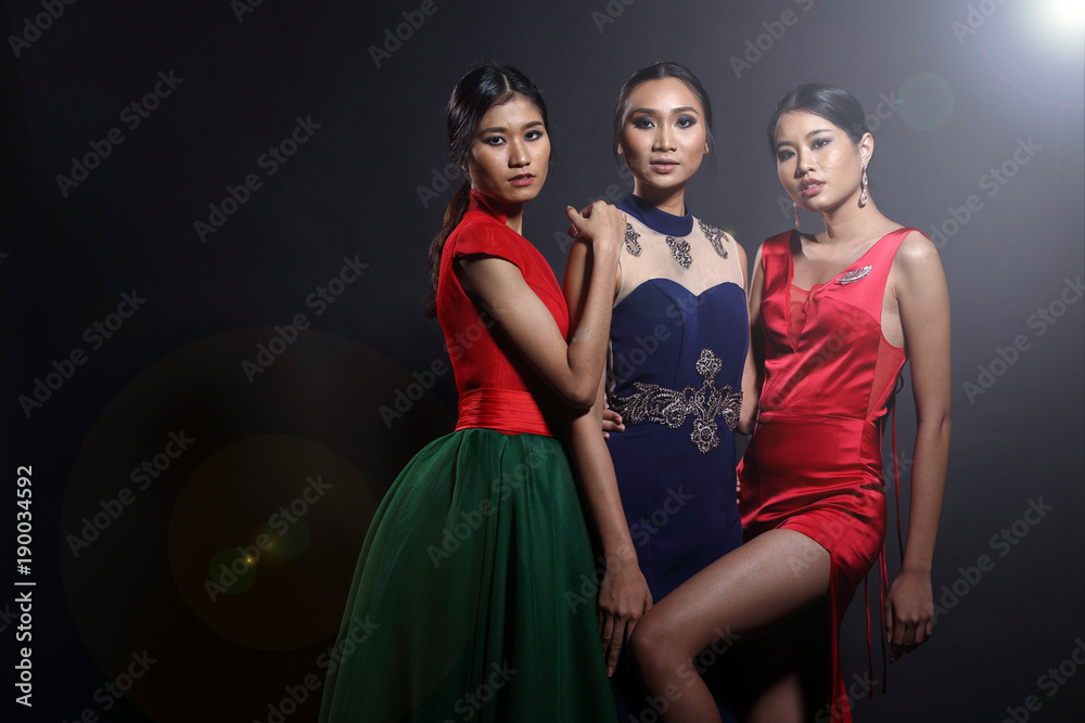 Asian woman in evening long ball dress Asian woman in evening long ball dress