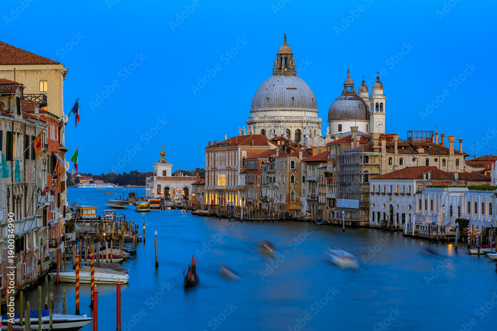 Sunset view of the iconic 17th-century Santa Maria di Salute Basilica on the Grand Canal in Venice