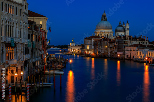 Sunset view of the iconic 17th-century Santa Maria di Salute Basilica on the Grand Canal in Venice © SvetlanaSF