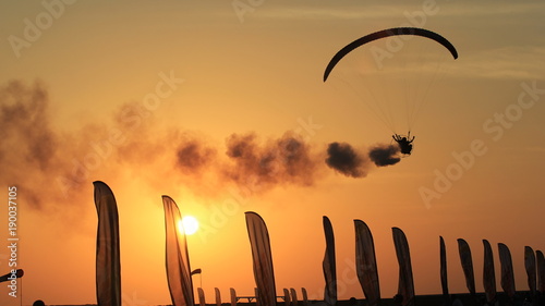 Photography Mobile Paragliding in sunset, silhouette in the summer  dusk in Skydive Dubai, U