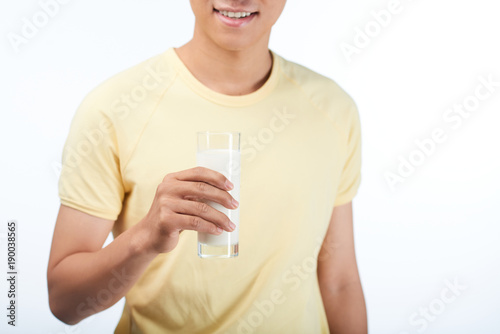 Young Man with Glass of Milk