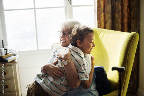 Fotografia, Obraz Grandma and grandson hugging together