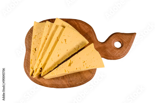 Cutting board with chopped cheese isolated on white background