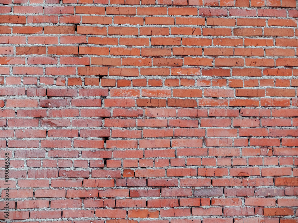 Naklejka premium Old brick wall of red brick.
