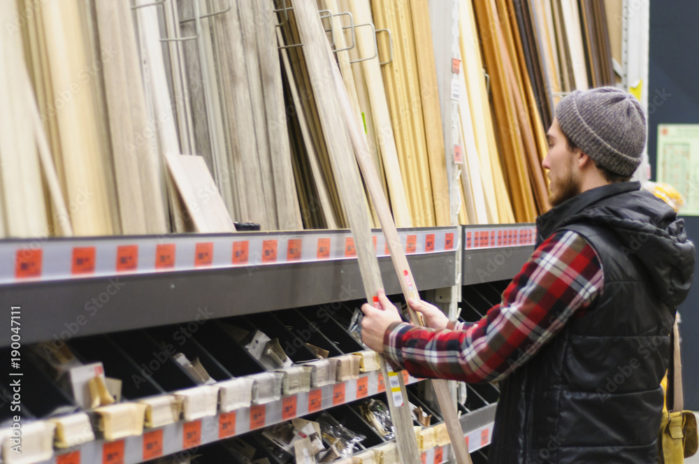 Man in a hardware store Man in a hardware store