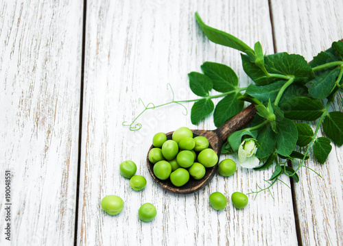 green peas on a table © Olena Rudo