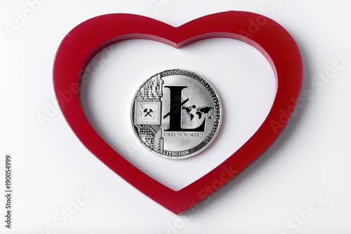 Silver colored coin Litecoins - international virtual cryptocurrency. photo