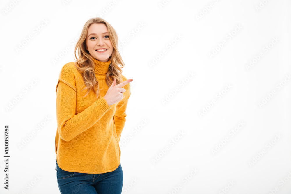 Young woman pointing. Young woman pointing.