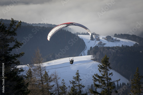 paragliding from mountain schoeckl in styria, austria