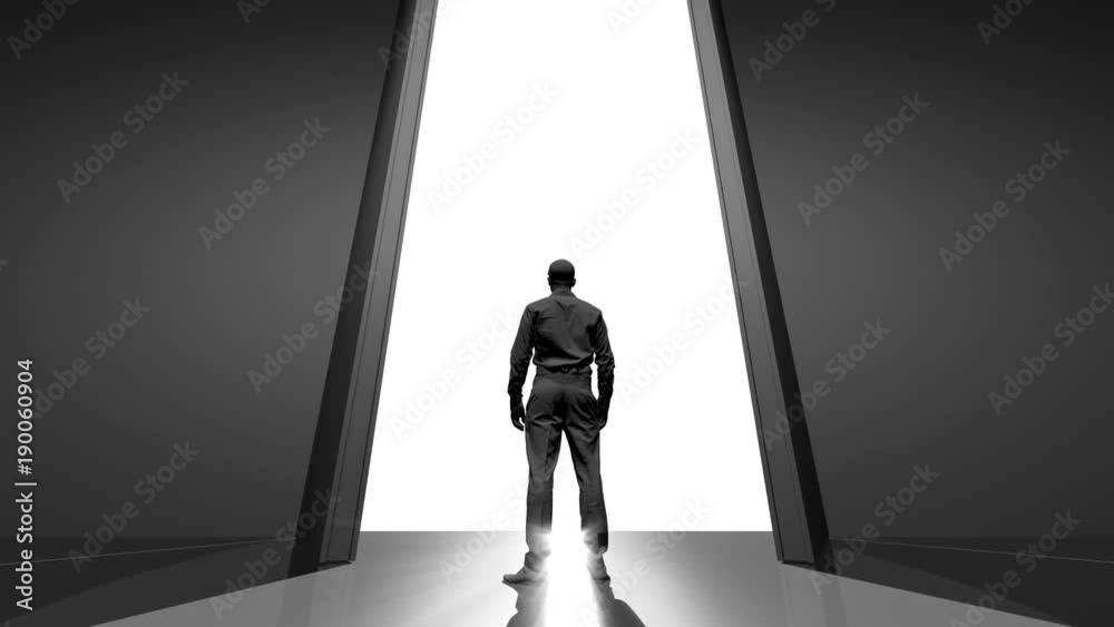 A man stands in front of the gate to the future