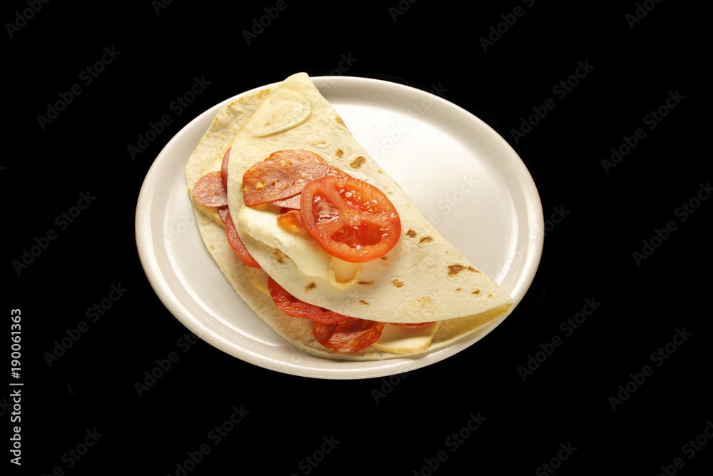 piadina with salami, tomatoes and cheese piadina with salami, tomatoes and cheese