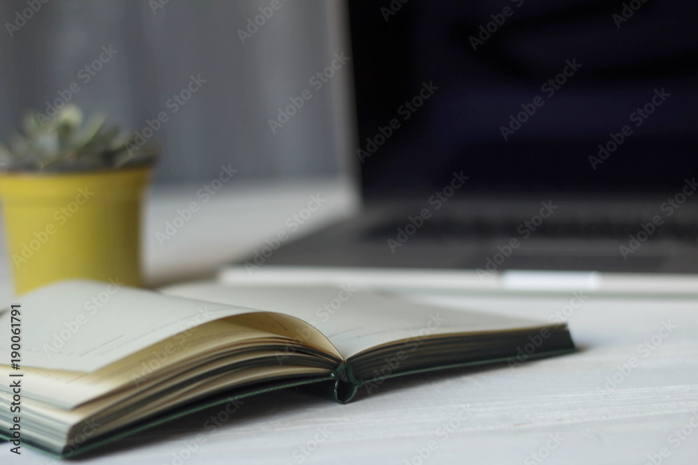 laptop and documents in the workplace. laptop and documents in the workplace.