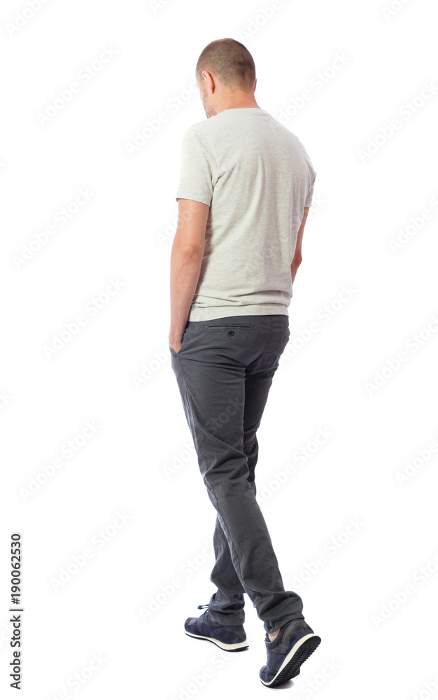 Back view of going handsome man. walking young guy . Back view of going handsome man. walking young guy .