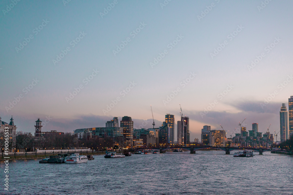 View of London from the River Thames at sunset