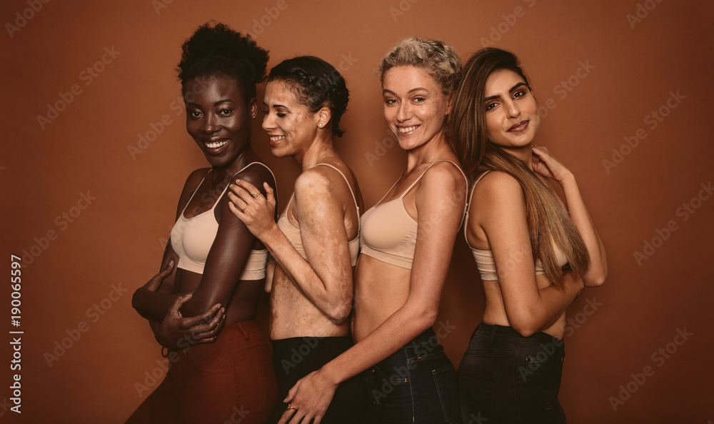 Female models with different skins - obrazy, fototapety, plakaty 