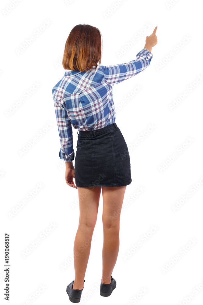 Back view of pointing woman. Back view of pointing woman.
