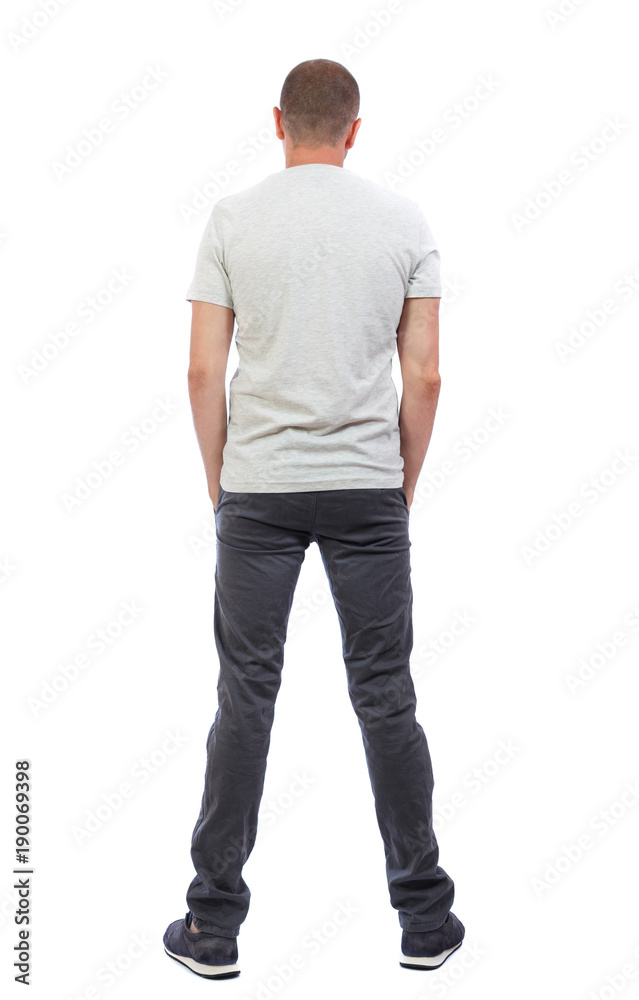 Back view of man in jeans. Back view of man in jeans.