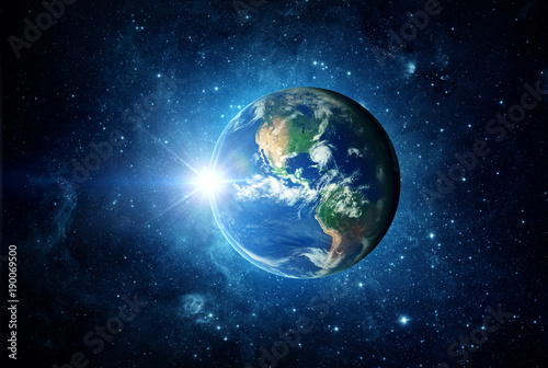 Fototapeta Naklejka Na Ścianę i Meble -  Earth, sun and galaxy. Elements of this image furnished by NASA