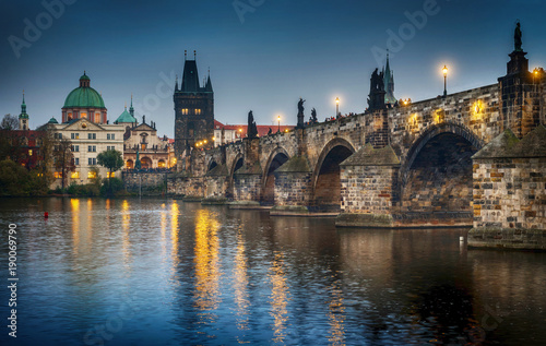 It s evening in the city of Prague. View of the castle and the Charles bridge. Czech Republic.