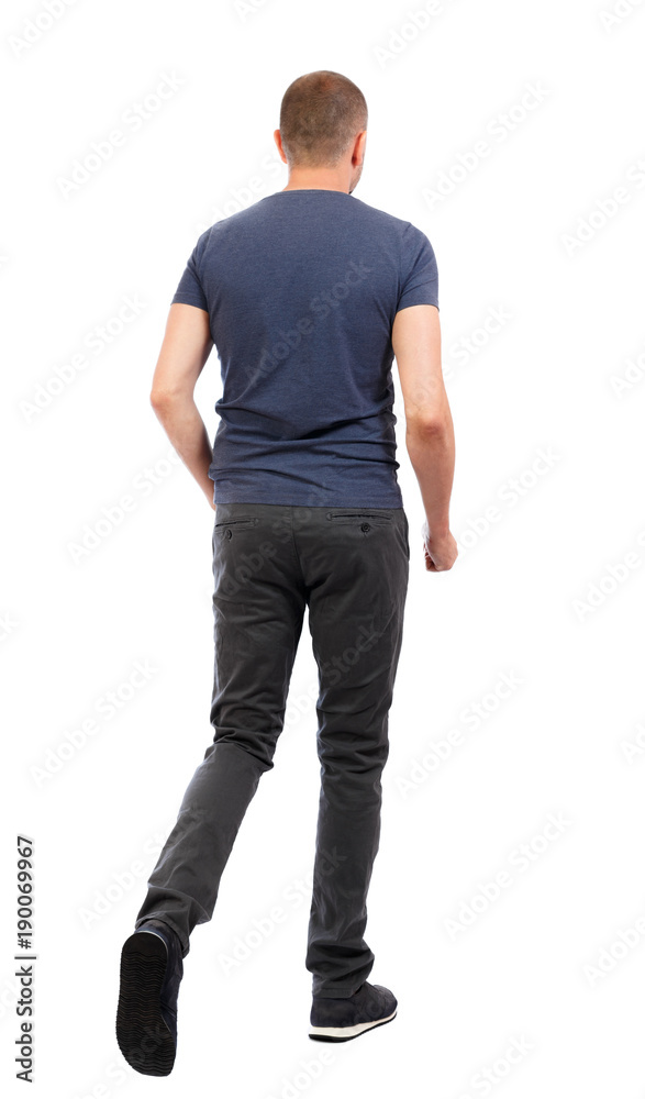 Back view of going handsome man. walking young guy . Back view of going handsome man. walking young guy .
