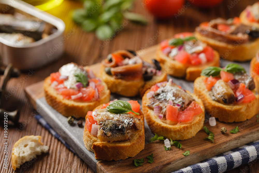 Mix Bruschetta with sardines and anchovies. Mix Bruschetta with sardines and anchovies.