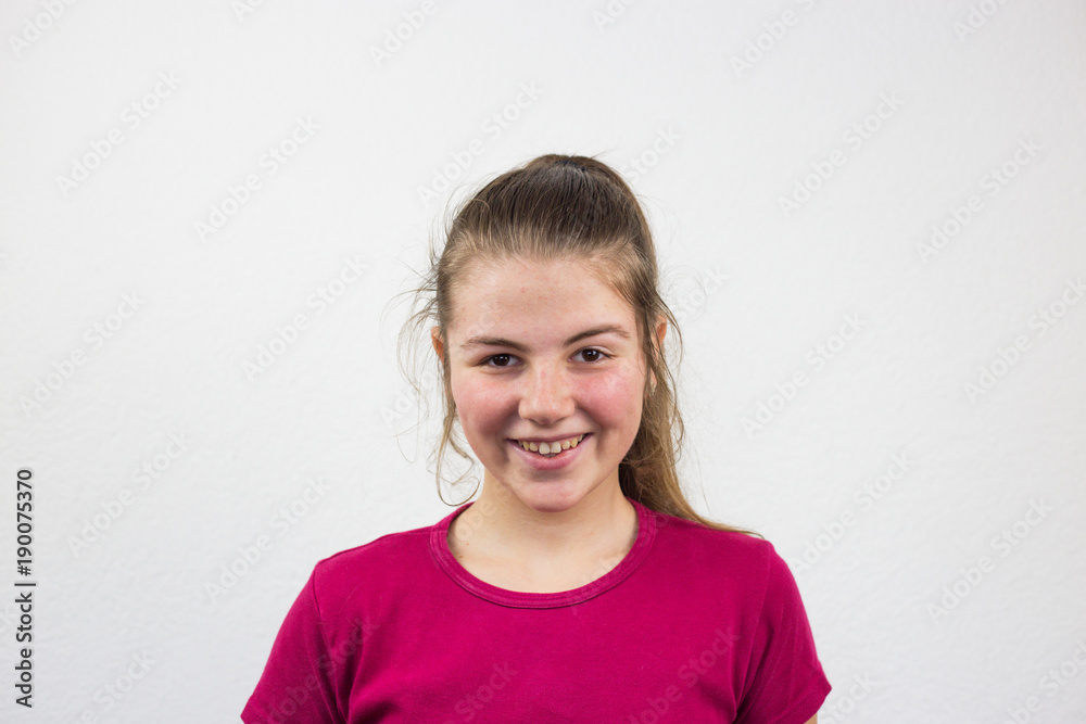 Teenager with a smile, white background, facial expressions, happiness, joy Teenager with a smile, white background, facial expressions, happiness, joy