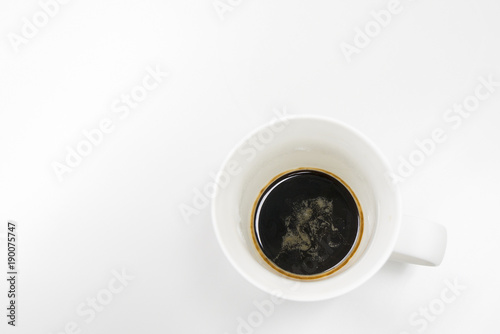 Black coffee in white glass with white background