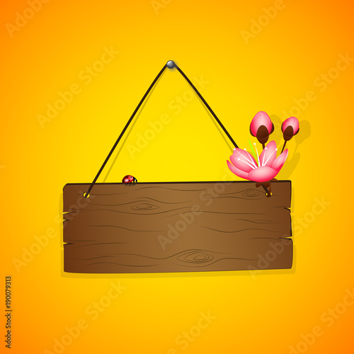 holzschild mit rosa kirschblüte gelber hintergrund
