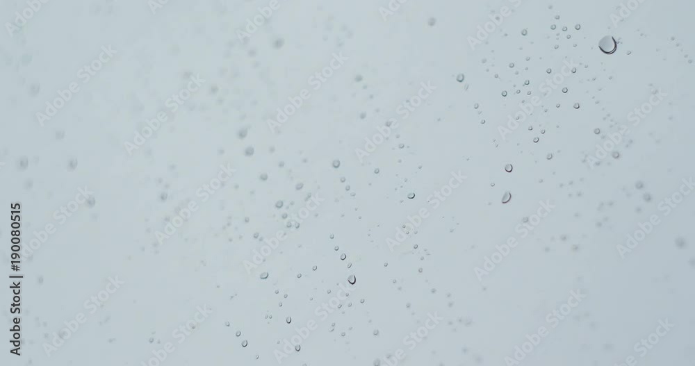 A drop of water on a glass with a floating focus A drop of water on a glass with a floating focus