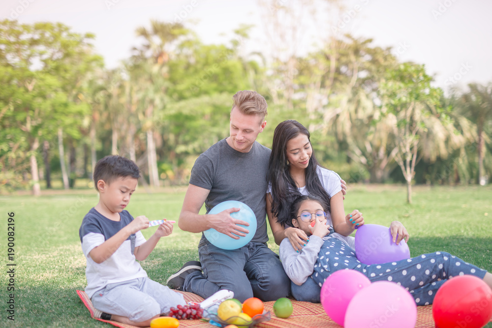 Young family with children having fun in nature Young family with children having fun in nature