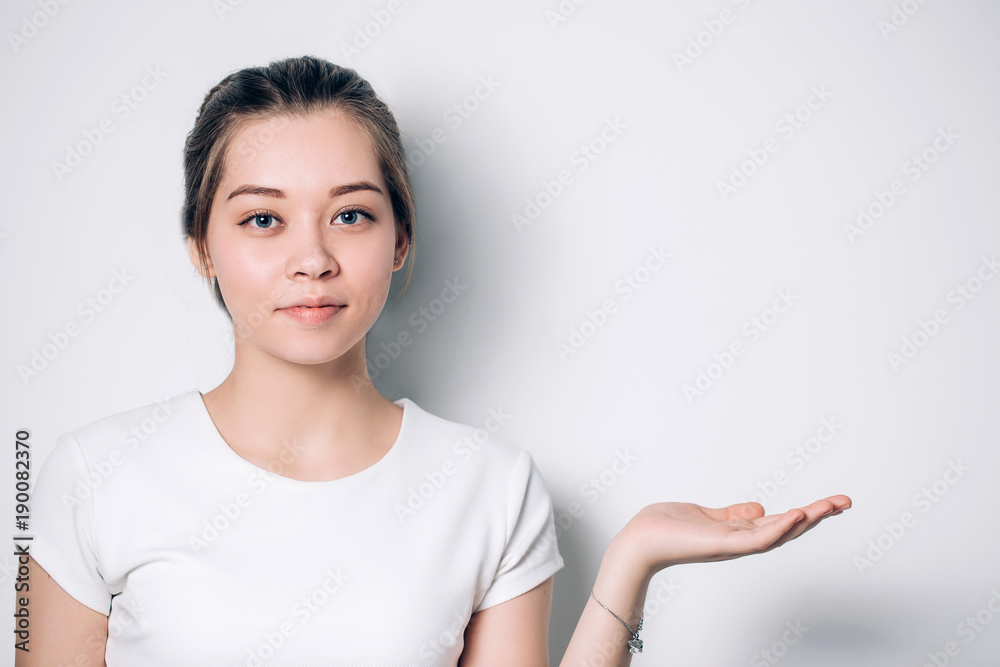 Woman showing on you product. Beautiful girl Presenting your product. Woman showing on you product. Beautiful girl Presenting your product.