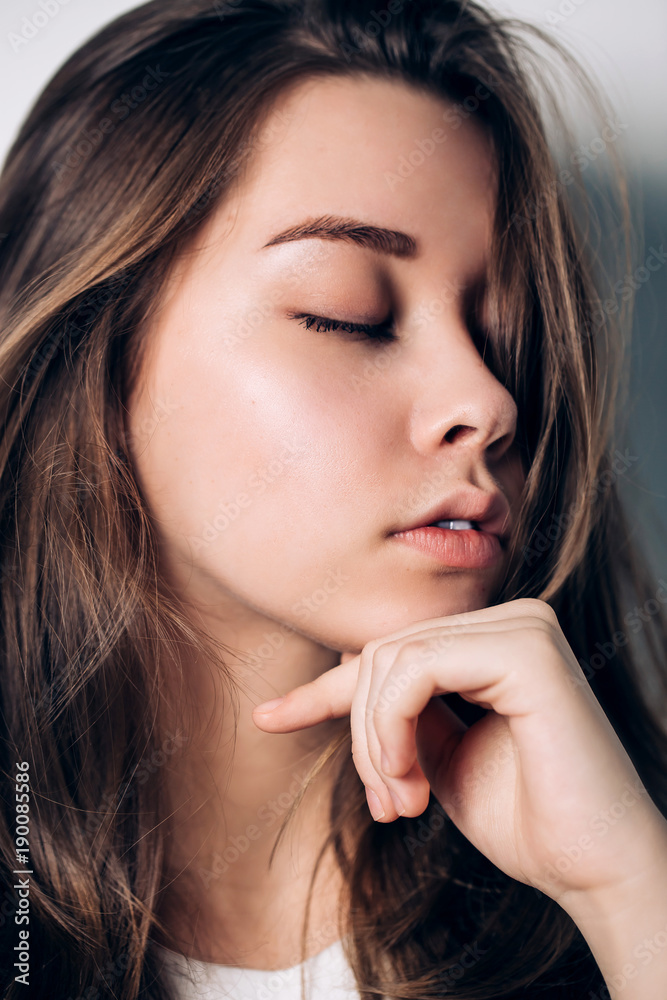 Close up portrait of beautiful sexy woman with closed eyes Close up portrait of beautiful sexy woman with closed eyes