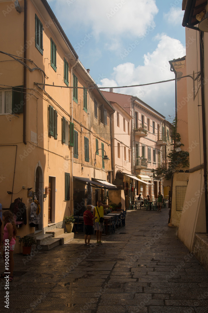 Capoliveri main street on a sunny day. Elba island, Tuscany, Italy.