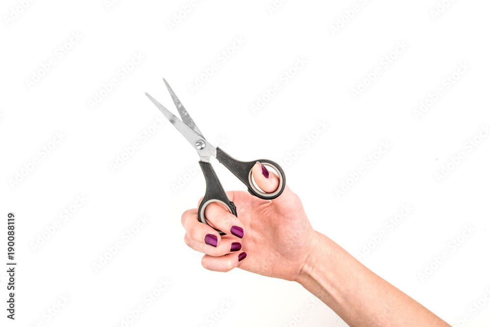 Woman Hand Holding Small Scissors On White Background Woman Hand Holding Small Scissors On White Background