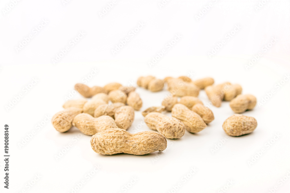 Pile Of Peanuts On White Background Closeup Pile Of Peanuts On White Background Closeup