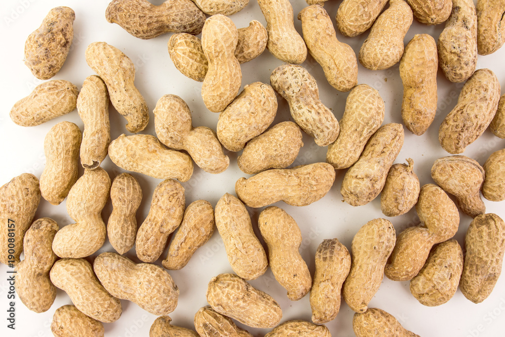 Pile Of Peanuts On White Background Closeup Pile Of Peanuts On White Background Closeup
