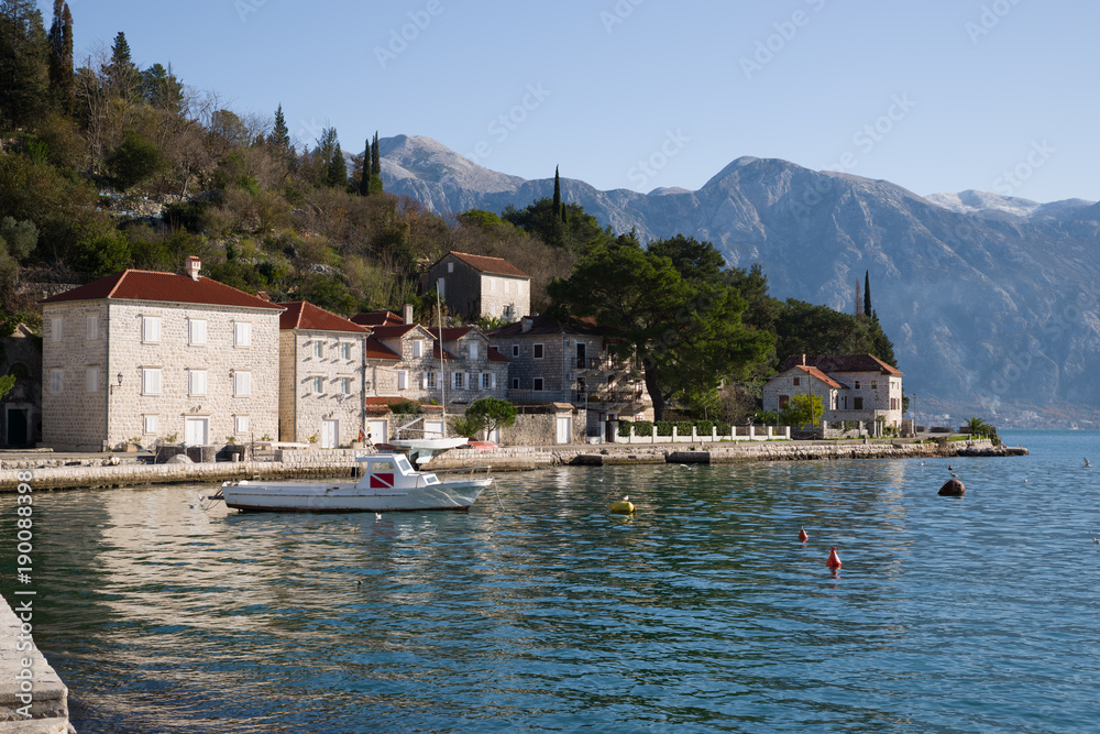 Beautiful view of the houses on the waterfront in Perest and the mountains in the background, Montenegro