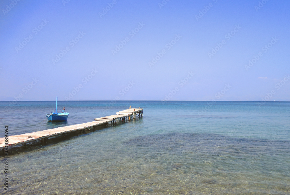 Small pier on the beach of Corfu Island