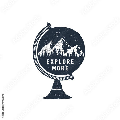 Hand drawn travel badge with mountains in a globe textured vector illustration and "Explore more" inspirational lettering.