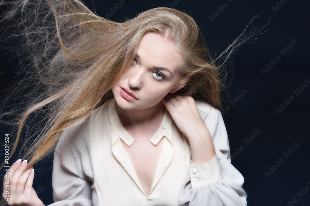Fototapeta premium Sexy Woman with long blowing hair
