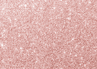 Rose gold background glitter texture pink sparkling shiny wrapping paper for Christmas holiday seasonal wallpaper decoration, greeting and wedding invitation card design element